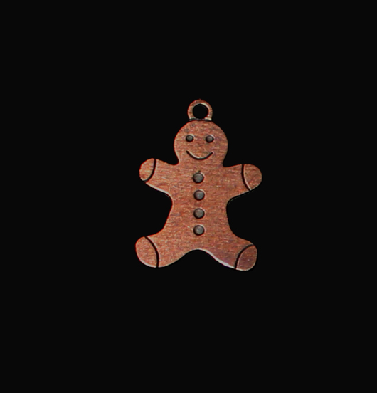 Ciondolo a forma di omino di Panpepato in rame per personalizzare i regali di natale. Regalo dedicato a chi ama i biscotti.