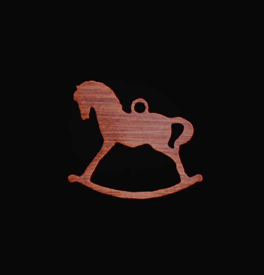 Rocking horse shaped copper pendant enamelled in pink. Gift dedicated to Christmas and to children.