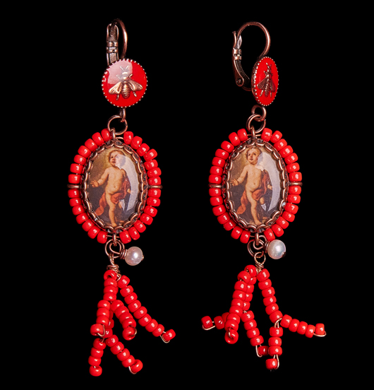 ORECCHINI Madre cristiana Padre pagano