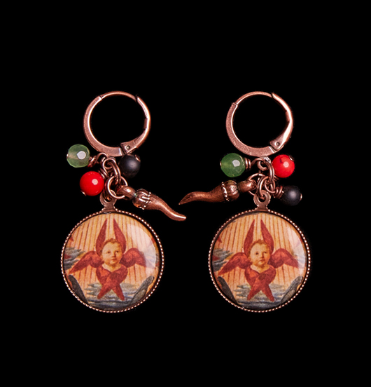 ORECCHINI Madre cristiana Padre pagano
